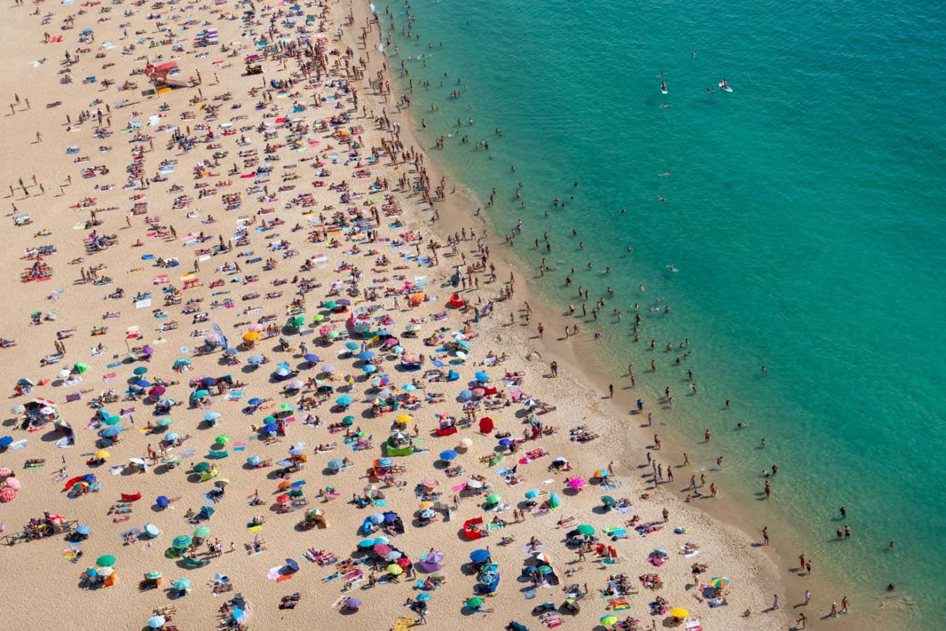 Aerial view of a crowded beach from above, praia de Nazar?, Portugal, Europe; Shutterstock ID 2189816843; purchase_order: -; job: -; client: -; other: -