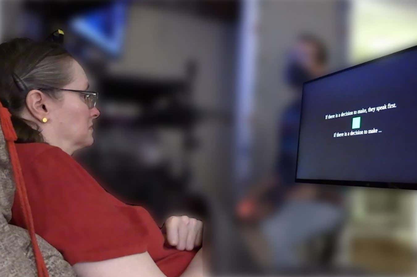 Someone with paralysis using the brain-computer interface. The text above is the cued sentence and the text below is what is being decoded in real-time as she imagines speaking the sentence