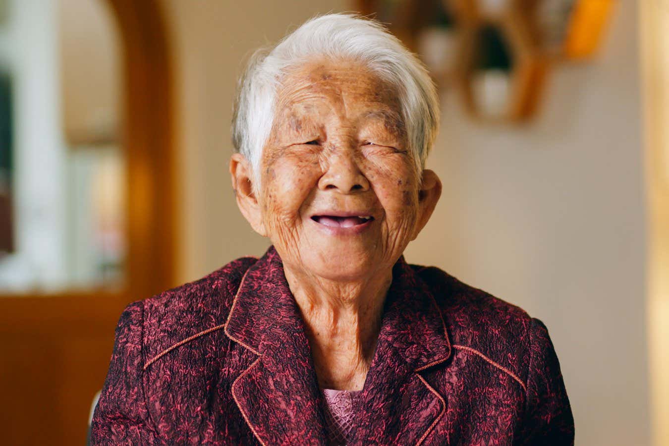 portrait happy senior asian woman look at camera