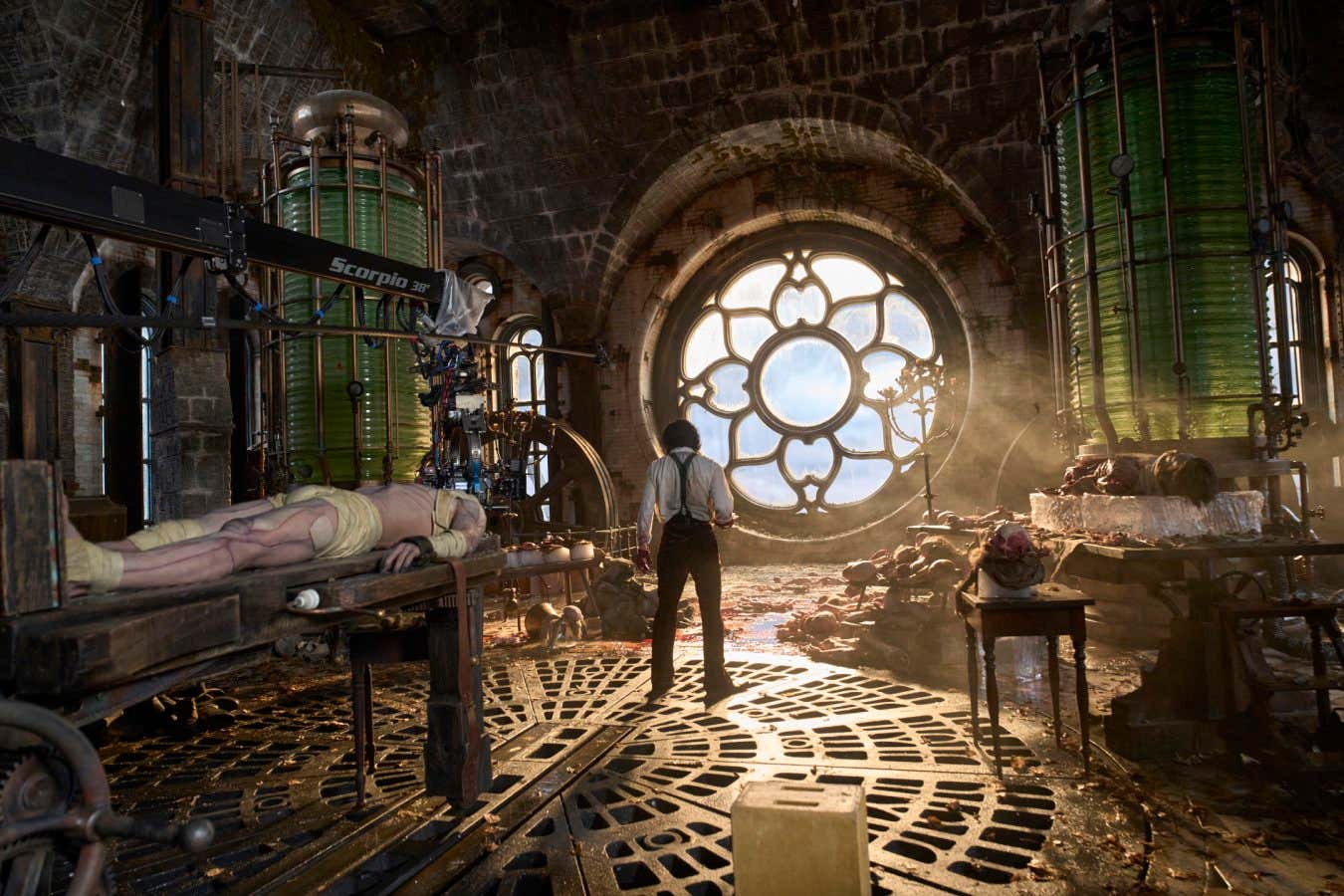 Netflix handout film still -- Frankenstein. BTS - (L to R) Jacob Elordi as The Creature and Oscar Isaac as Dr. Victor Frankenstein on the set of Frankenstein. Cr. Ken Woroner/Netflix ?? 2025.